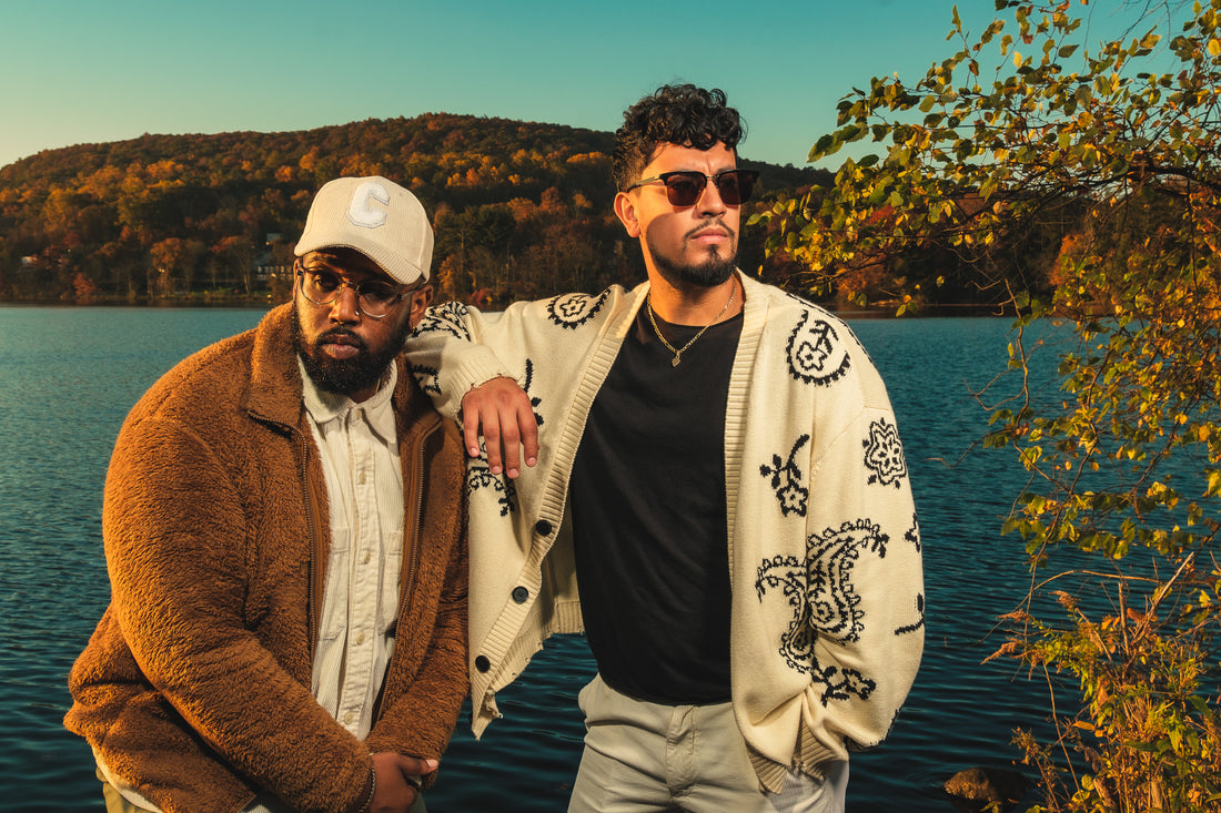 Two young men with confidence at a lake during sunrise